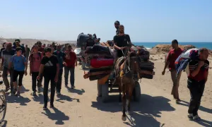 Israel ngừng bắn, hàng nghìn người Gaza quay về nhà